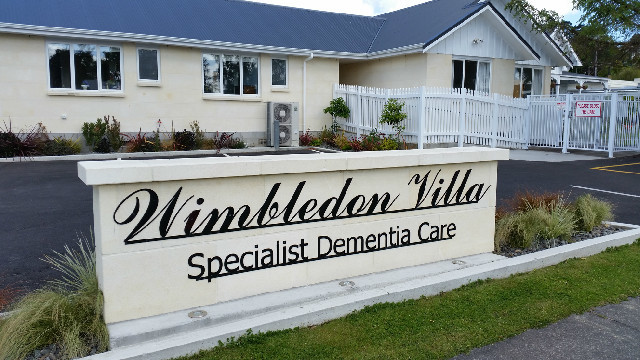 Caregiver supporting a Wimbledon Villa resident
