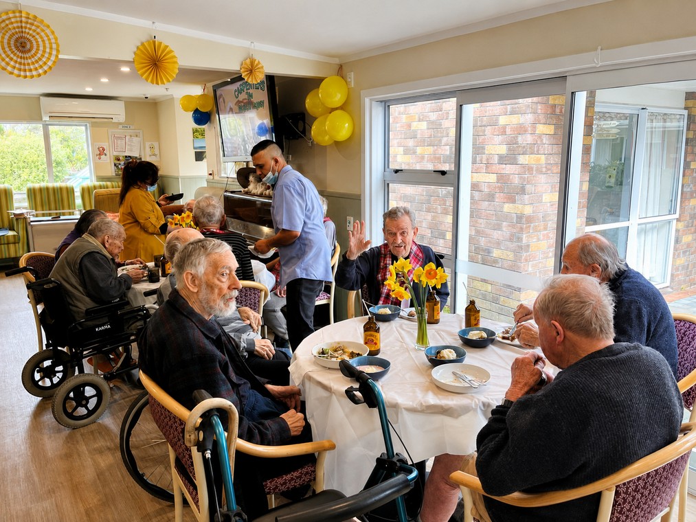 Residents enjoying a small celebration at Wimbledon Villa, Feilding